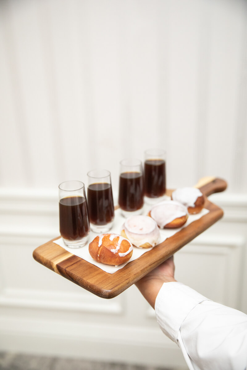 donuts and coffee on a tray
