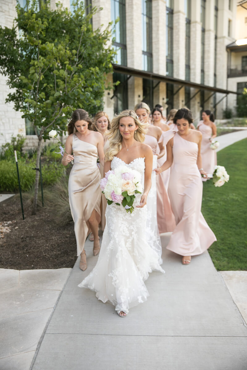 brittney walking with her bridesmaids