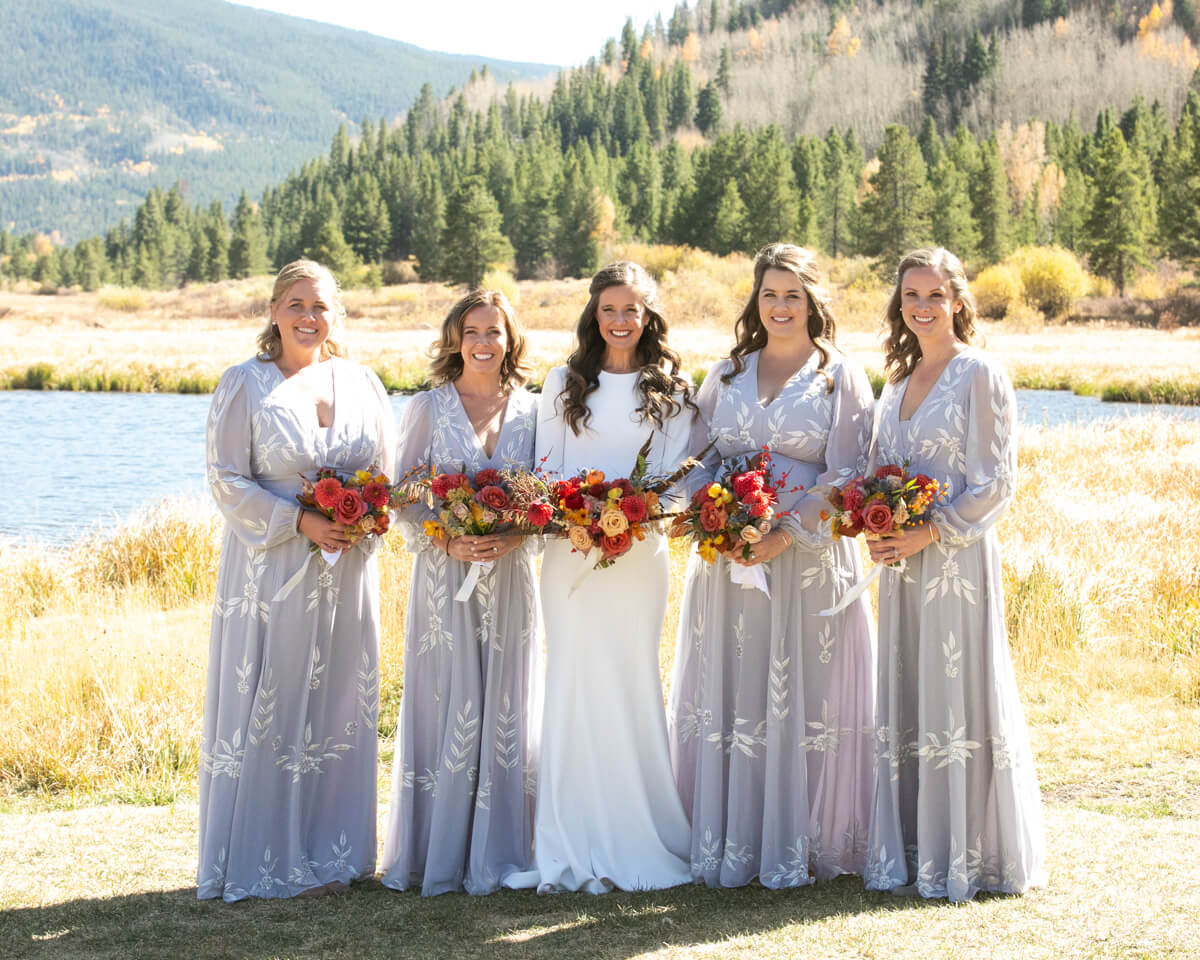 bride and bridesmaids in the mountains
