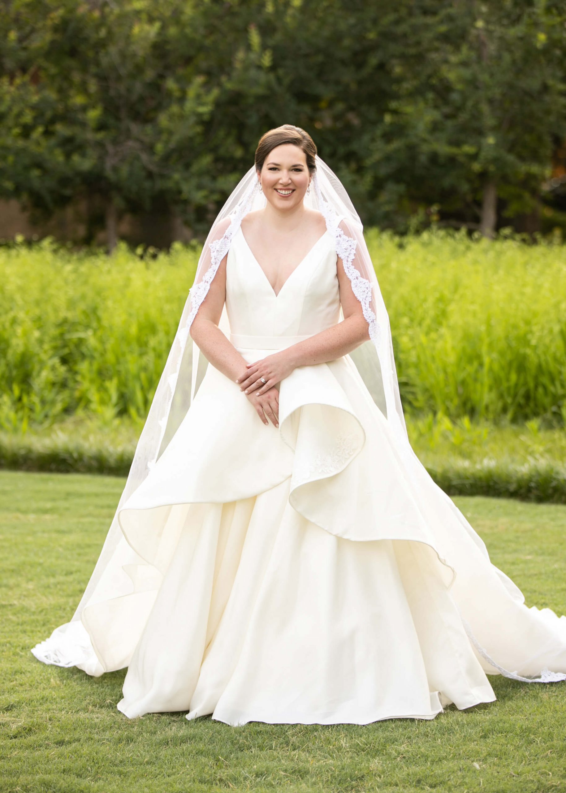 Carole Anne in her bridal gown in a park