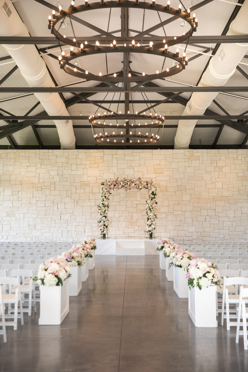 pink and white floral arch