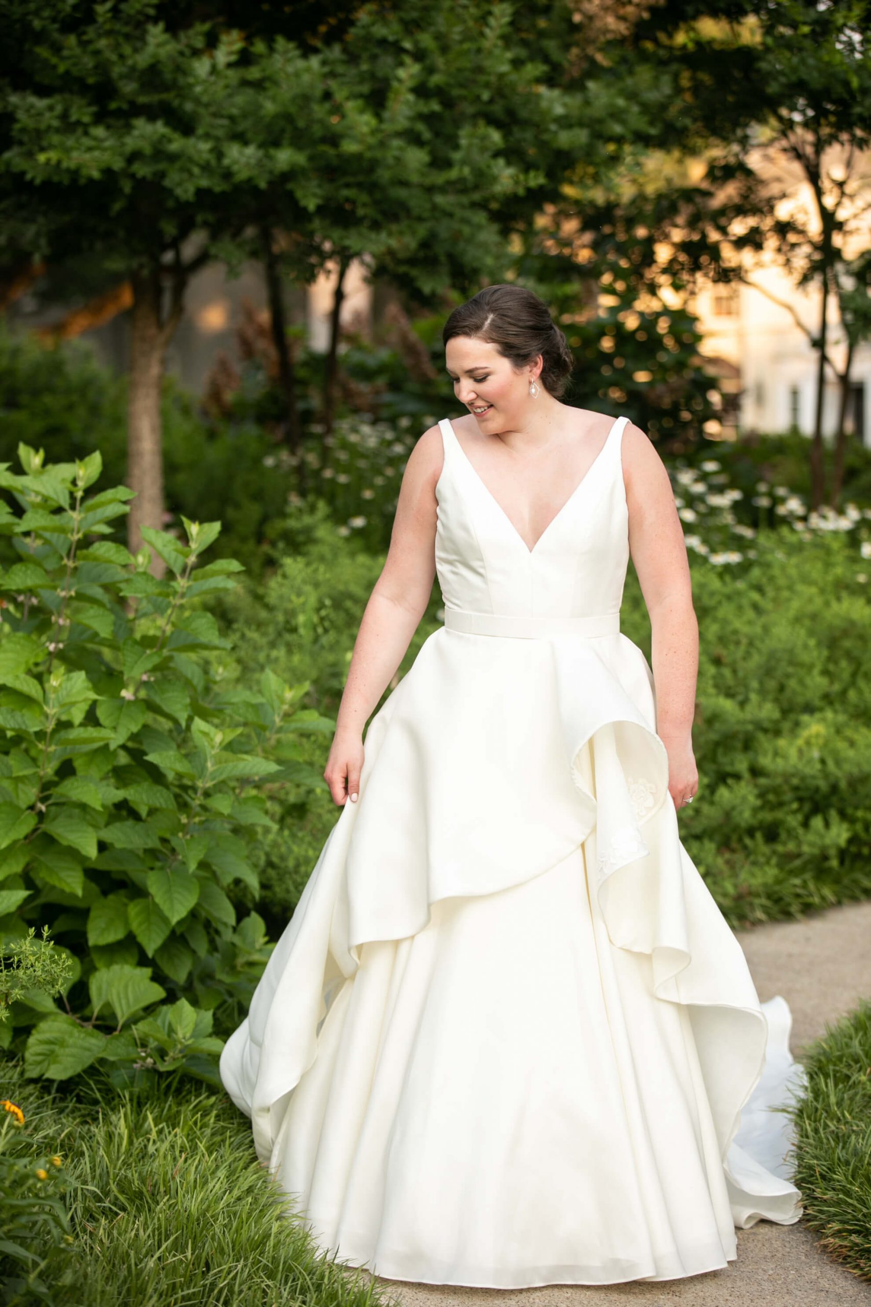 Carole Anne in her bridal gown in a park