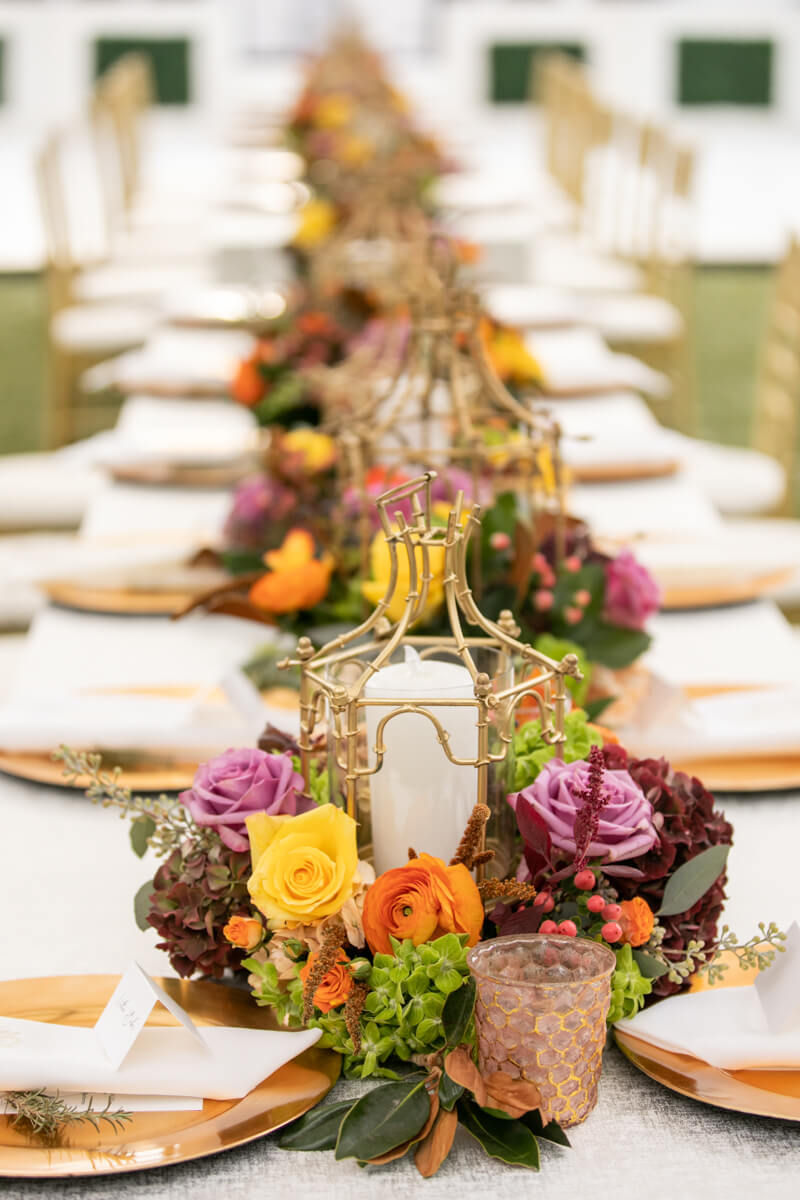 gold pagoda candle holders and fall florals