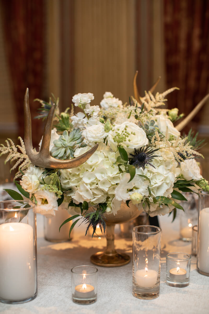 floral arrangement with antlers