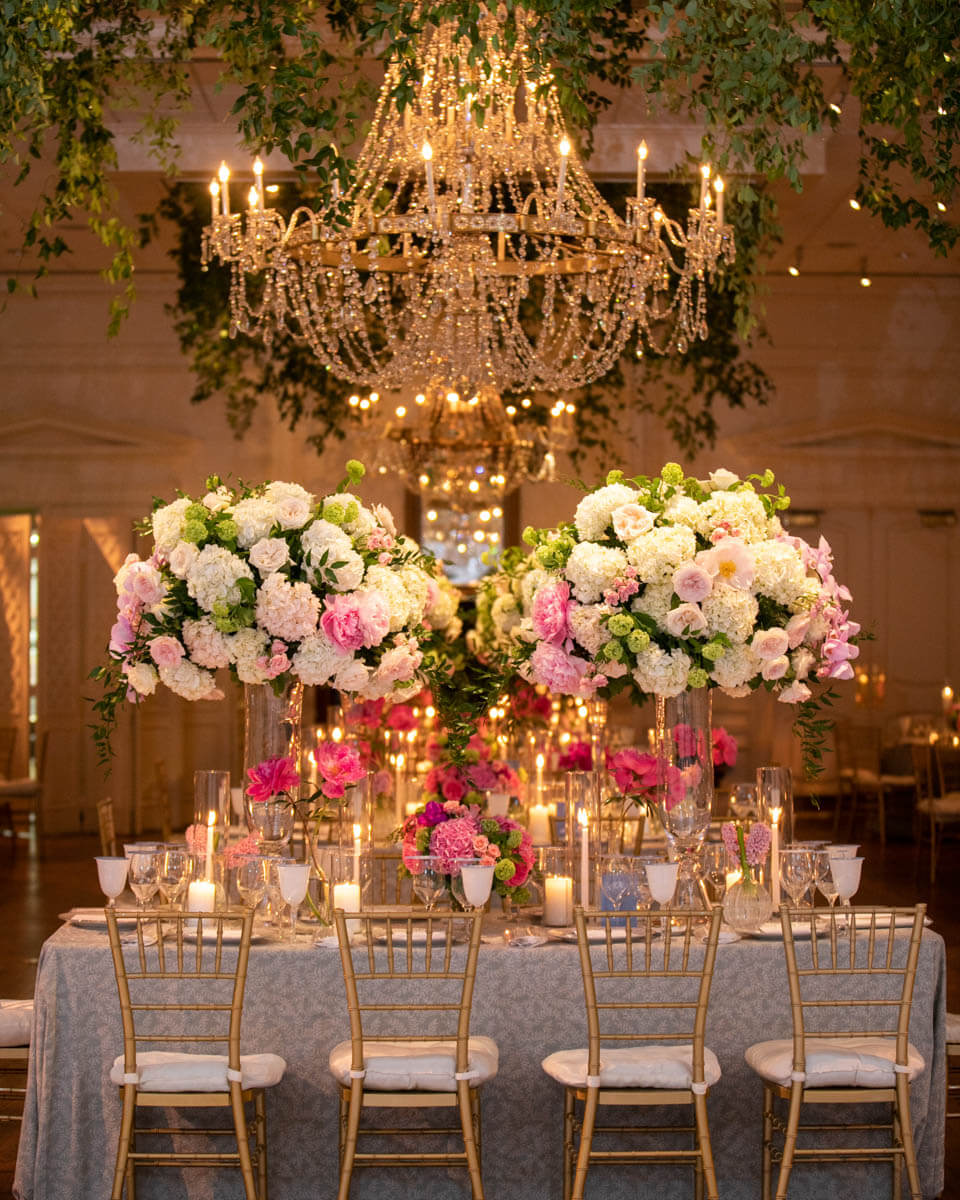 two tall floral arrangements
