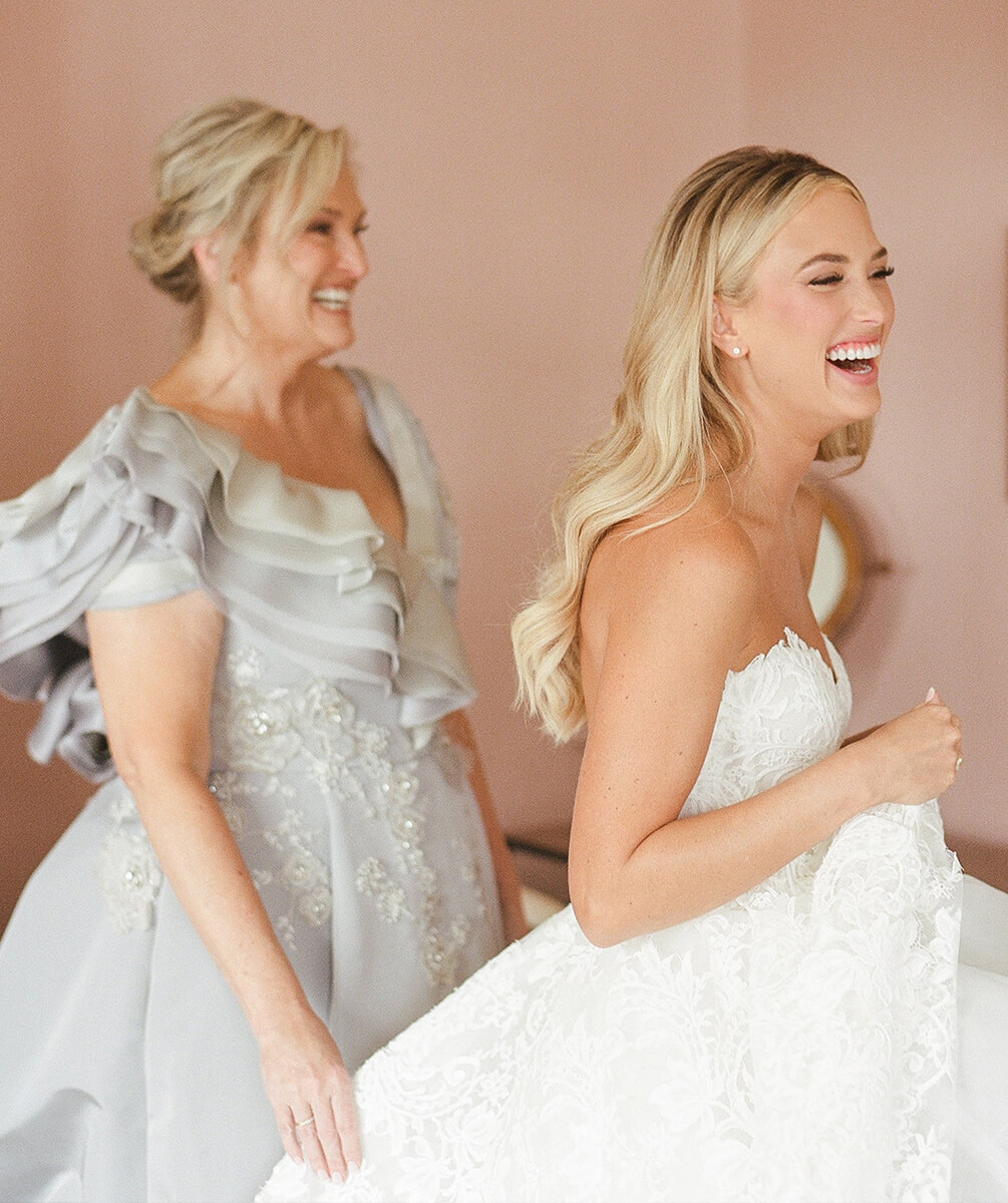 Mother and bride laughing