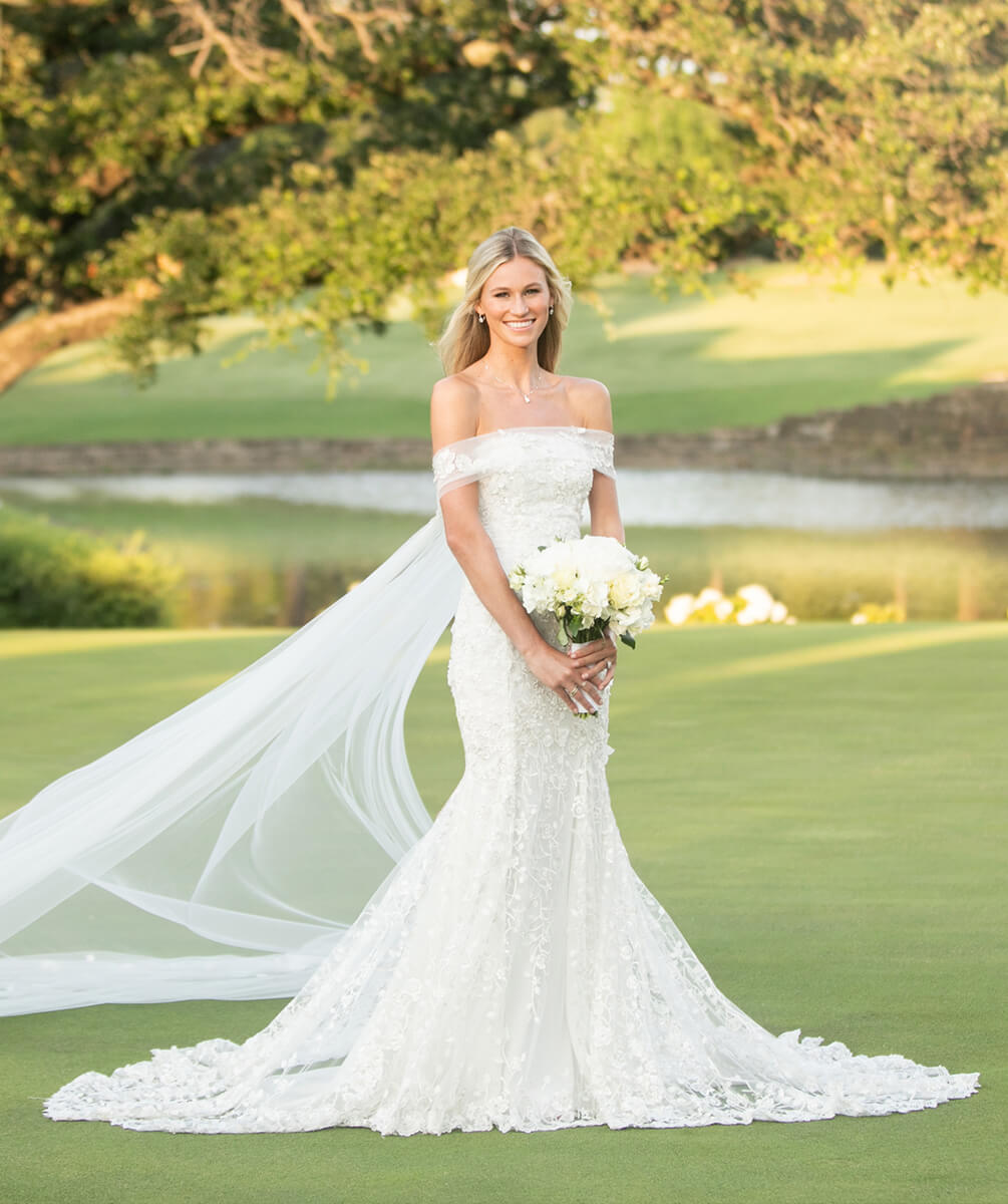 Bridal portrait with pond in background