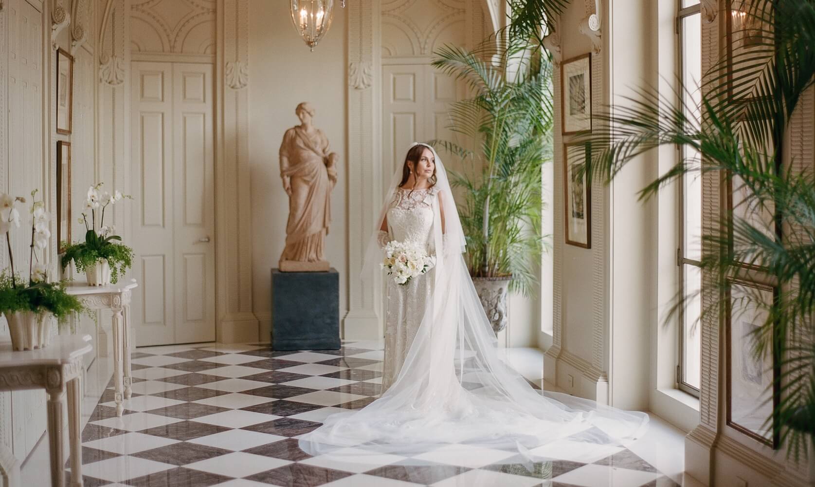 Photo of bride in hall with tiled floor